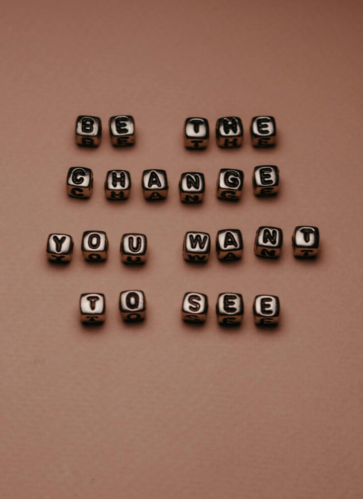 A message created by beads on a brown background.