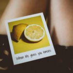 Photography of lemons and the saying "When life gives you lemons".